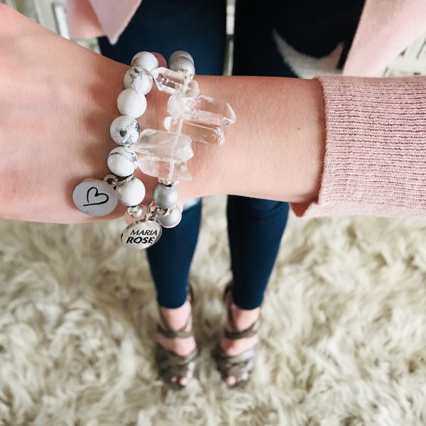 white howlite beaded bracelet with crystals on female wrist with silver Maria Rose jewelry charm